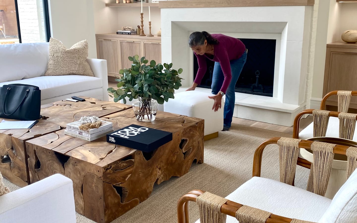 Lisa at work during an installation, styling a room as it comes together
