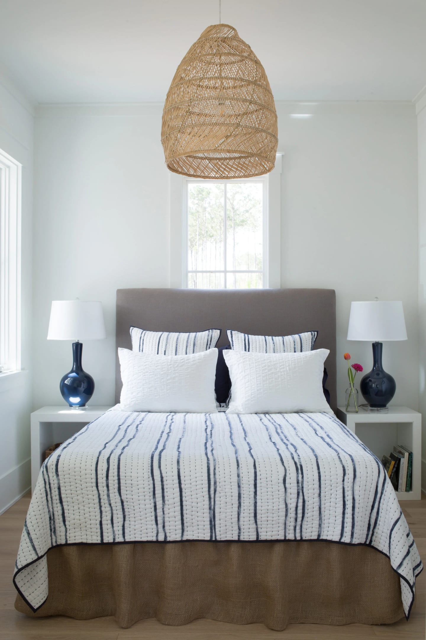 Bedroom striped bedding, Duck Crossing Residence in Palmetto Bluff, South Carolina